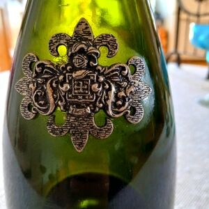 Very neat wine bottle with metal decorations